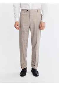 Reserved - Garniturowe spodnie carrot - brązowy. Kolor: brązowy. Materiał: tkanina, wiskoza #1