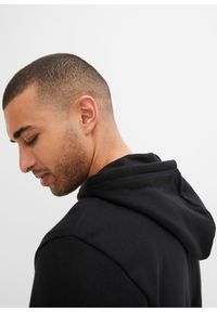 bonprix - Bluza z kapturem zapinana na zamek. Okazja: na co dzień. Typ kołnierza: kaptur. Kolor: czarny. Materiał: dzianina, dresówka. Styl: casual #3