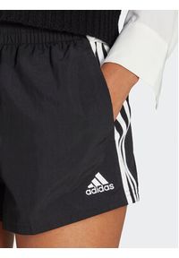 Adidas - adidas Szorty sportowe Essentials 3-Stripes HT3397 Czarny Loose Fit. Kolor: czarny. Materiał: syntetyk