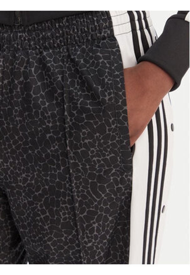 Adidas - adidas Spodnie dresowe Adibreak KD2830 Czarny Loose Fit. Kolor: czarny. Materiał: syntetyk