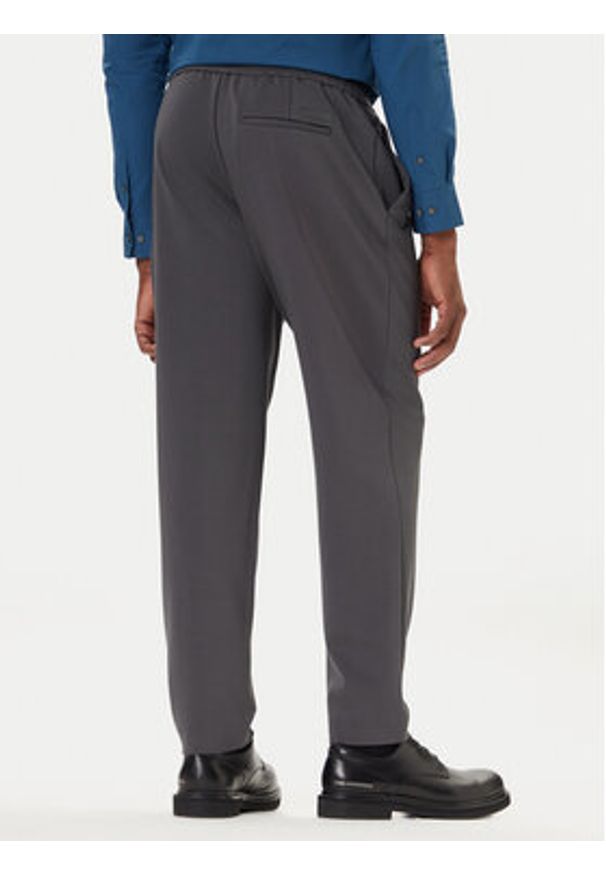 Calvin Klein Chinosy LV04LE613G Szary Slim Fit. Kolor: szary. Materiał: wiskoza