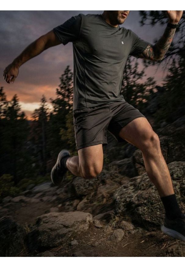 Sinsay - Szorty sportowe SNSY PERFORMANCE - zielony. Kolor: zielony. Styl: sportowy