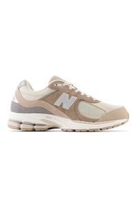 Buty New Balance U M2002RSI beżowy. Kolor: beżowy. Materiał: materiał, syntetyk, skóra, guma. Szerokość cholewki: normalna. Sport: turystyka piesza