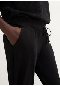 bonprix - Spodnie z dżerseju z mieszanki bawełny. Kolor: czarny. Materiał: jersey, bawełna. Styl: elegancki #3