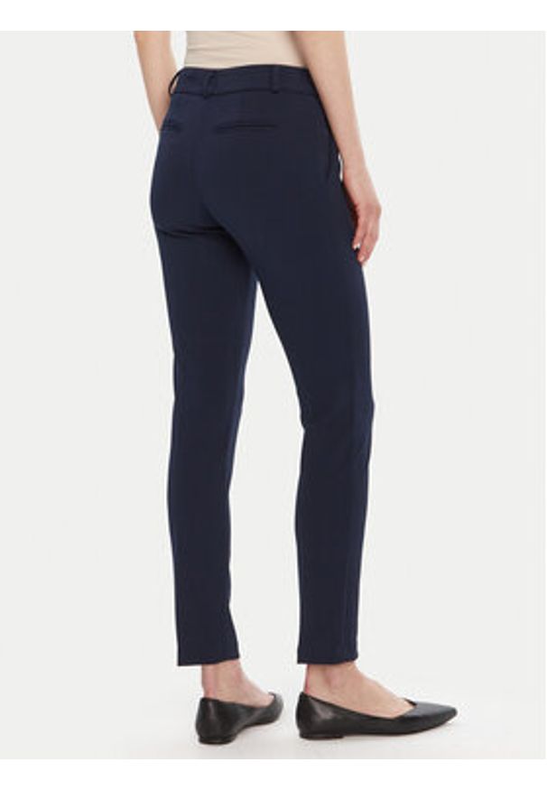 Rinascimento Chinosy CFC0126226003 Granatowy Slim Fit. Kolor: niebieski. Materiał: syntetyk