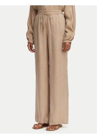 Guess Spodnie materiałowe W6GB07 W1781 Beżowy Regular Fit. Kolor: beżowy. Materiał: lyocell #1
