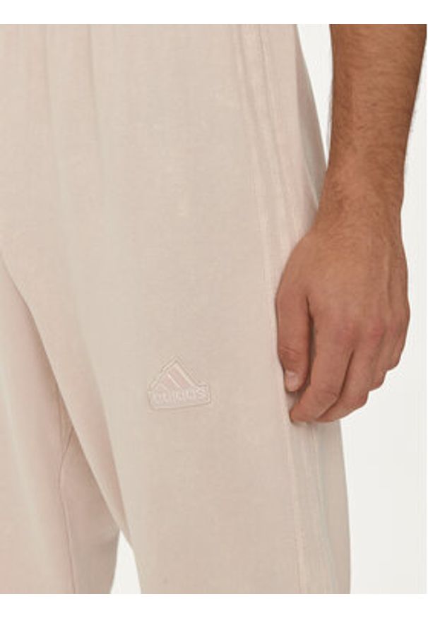 Adidas - adidas Spodnie dresowe ALL SZN 3-Stripes IR5201 Różowy Regular Fit. Kolor: różowy. Materiał: bawełna