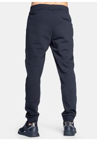 Spodnie dresowe męskie granatowe Armani Exchange 8NZPPA ZJ1ZZ 1510. Kolor: niebieski. Materiał: dresówka. Sport: turystyka piesza #2