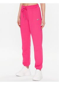 DKNY Sport Spodnie dresowe DP2P3114 Różowy Classic Fit. Kolor: różowy. Materiał: bawełna, dresówka, syntetyk #1