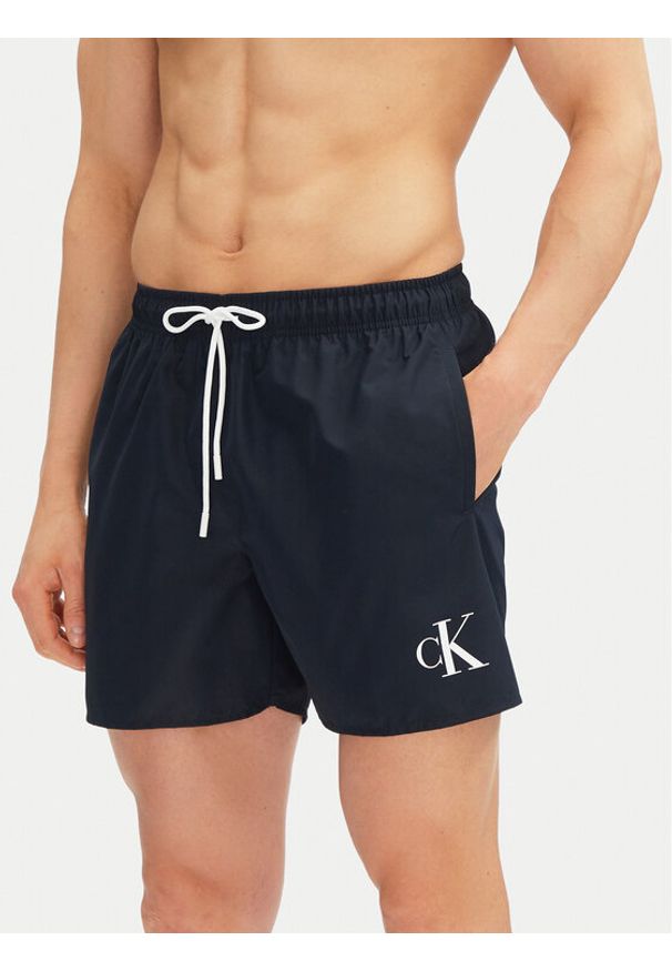 Calvin Klein Swimwear Szorty kąpielowe KM0KM01101 Granatowy Regular Fit. Kolor: niebieski. Materiał: syntetyk