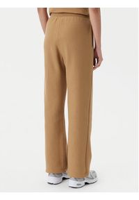 Champion Spodnie dresowe 117983 Brązowy Slim Fit. Kolor: brązowy. Materiał: bawełna #5