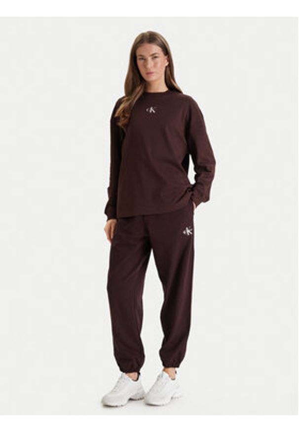 Calvin Klein Jeans Bluza Monologo LV047E211G Brązowy Oversize. Kolor: brązowy. Materiał: bawełna