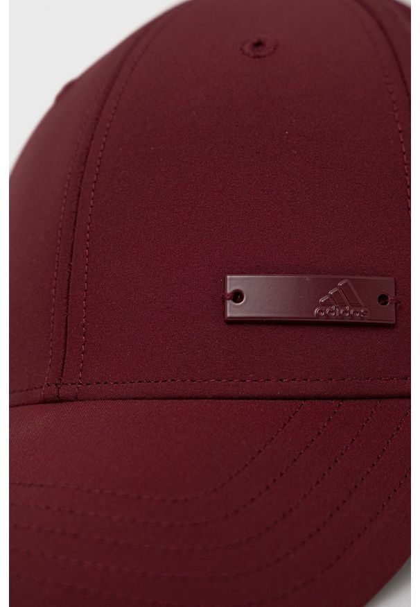 Adidas - adidas Czapka HD7238 kolor bordowy gładka. Kolor: czerwony. Materiał: poliester. Wzór: gładki