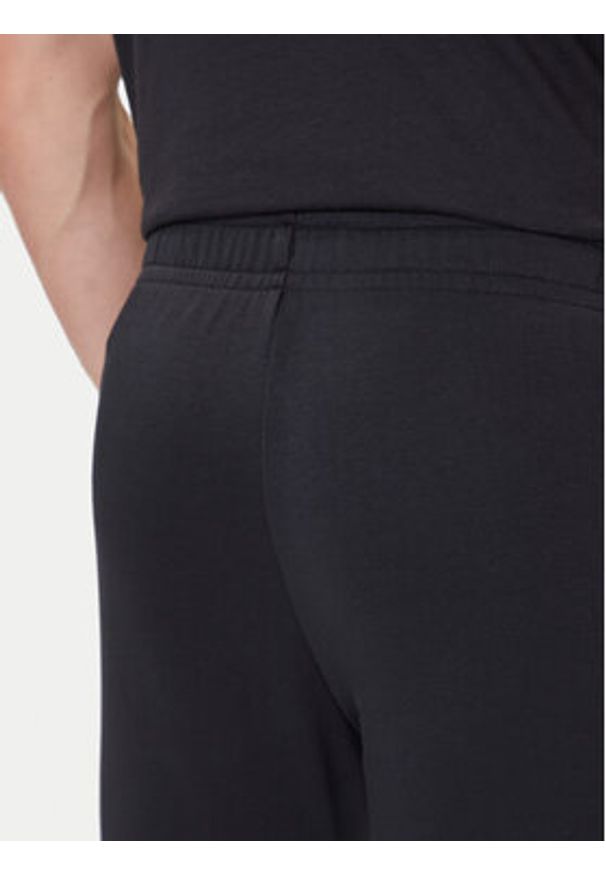 Under Armour Spodnie dresowe Ua Rival Terry Jogger 1380843-001 Czarny Fitted Fit. Kolor: czarny. Materiał: bawełna