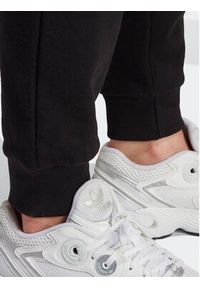 Adidas - adidas Spodnie dresowe adicolor Essentials IA6479 Czarny Slim Fit. Kolor: czarny. Materiał: bawełna #3