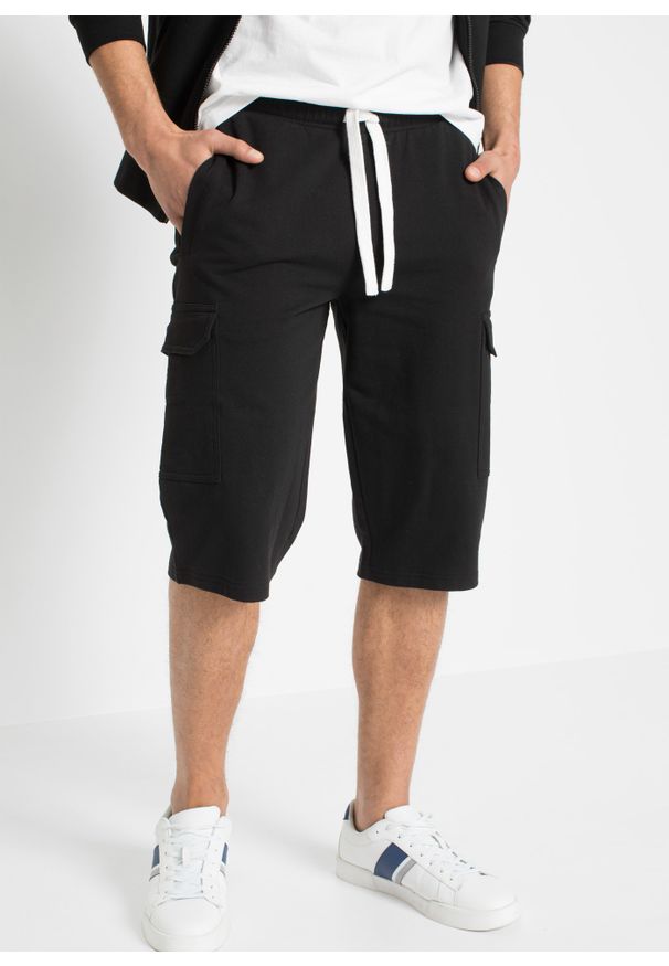 bonprix - Bermudy dresowe bojówki z kieszeniami z boku nogawek. Kolor: czarny. Materiał: dresówka