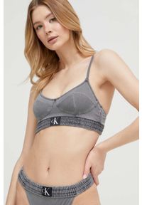 Calvin Klein biustonosz kąpielowy kolor szary lekko usztywniona miseczka. Kolor: szary