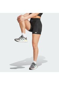 Adidas - Legginsy Own the Run Short. Kolor: czarny. Materiał: materiał. Długość: krótkie. Sport: bieganie