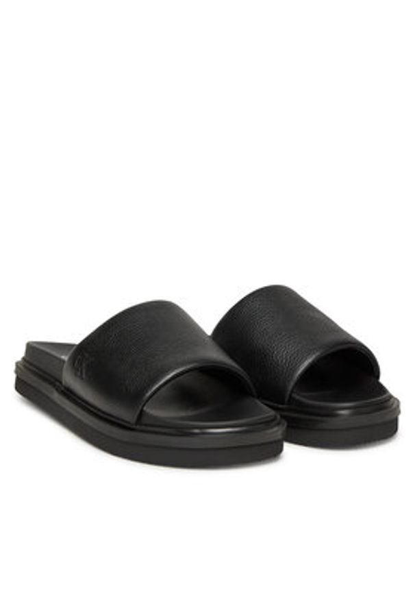 Calvin Klein Jeans Klapki Flat Molded Slide Sandal Lth YM0YM01225 Czarny. Kolor: czarny. Materiał: skóra