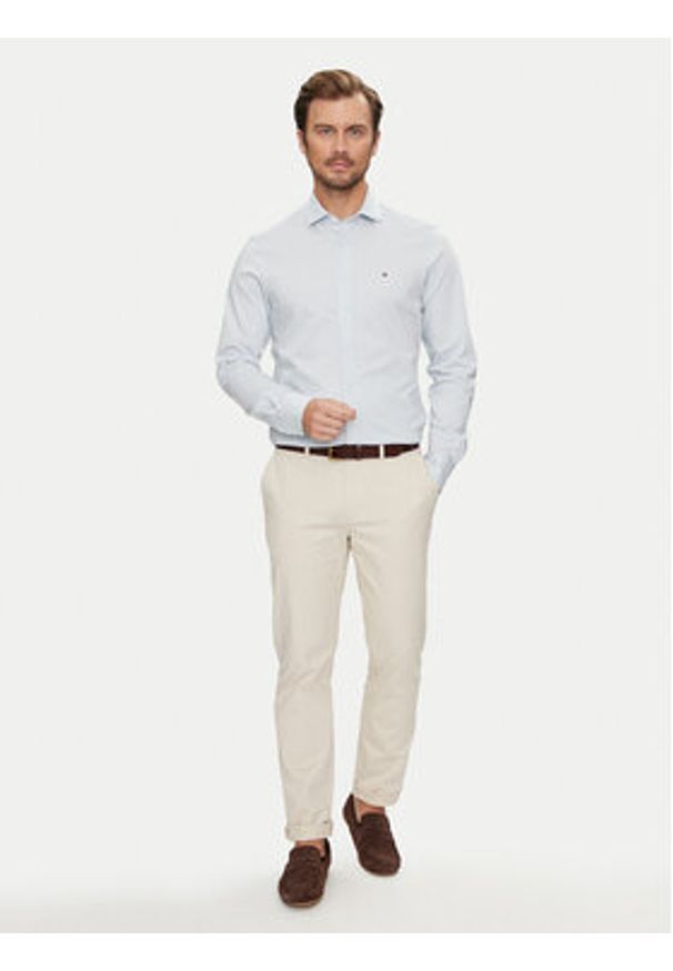 TOMMY HILFIGER - Tommy Hilfiger Koszula MW0MW35805 Błękitny Slim Fit. Kolor: niebieski. Materiał: bawełna