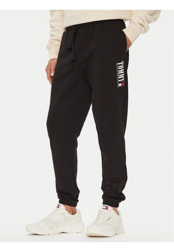 Tommy Jeans Spodnie dresowe Dna Graphic DM0DM22145 Czarny Slim Fit. Kolor: czarny. Materiał: bawełna