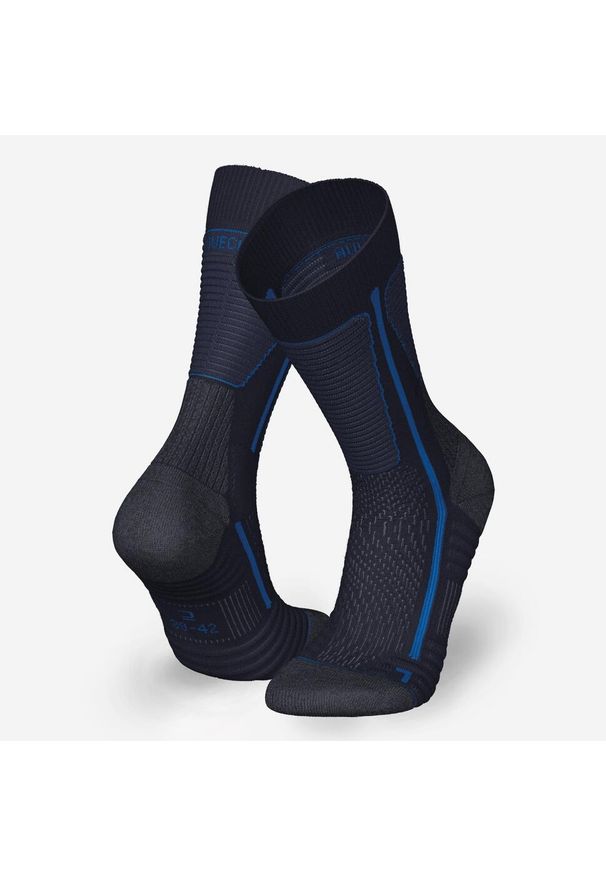 quechua - Skarpety turystyczne SH500 Mountain Mid. Kolor: niebieski. Materiał: poliester, wełna, poliamid, elastan. Sport: turystyka piesza