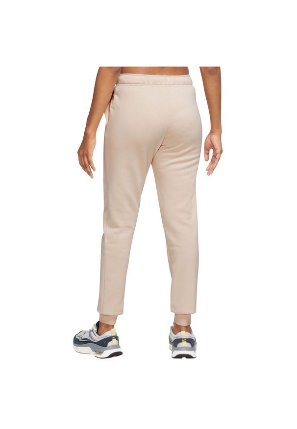 Nike - Spodnie sportowe damskie W NSW Club Fleece Pant. Kolor: beżowy. Materiał: bawełna, poliester