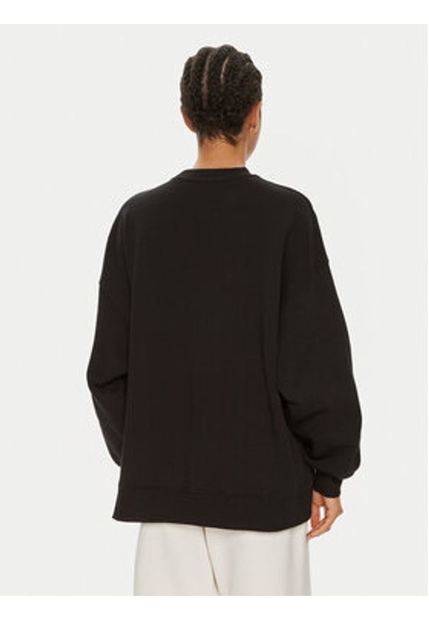 ROTATE Bluza Sui 112454100 Czarny Boxy Fit. Kolor: czarny. Materiał: bawełna
