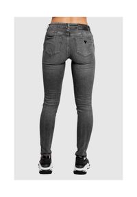 Guess - GUESS Szare jeansy damskie z brokatem. Kolor: szary. Wzór: aplikacja