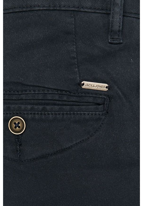 Jack & Jones - Spodnie. Kolor: niebieski. Materiał: tkanina. Wzór: gładki