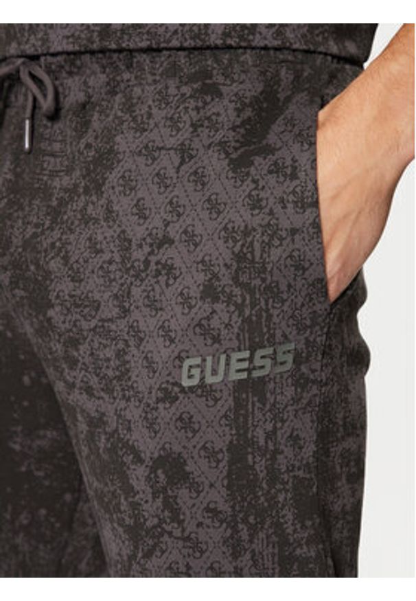 Guess Spodnie dresowe Z5RB14 K9YI1 Szary Regular Fit. Kolor: szary. Materiał: bawełna