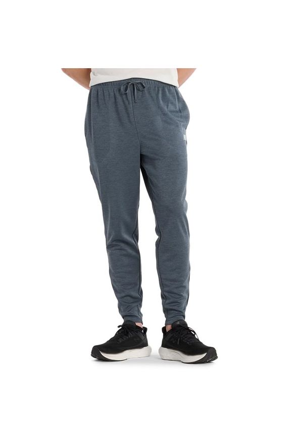 Spodnie męskie New Balance MP51905GT - szare. Kolor: szary. Materiał: poliester, materiał, dresówka