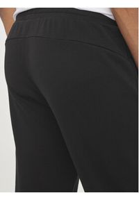 Puma Spodnie dresowe Ess Logo 586716 Czarny Regular Fit. Kolor: czarny. Materiał: bawełna #4
