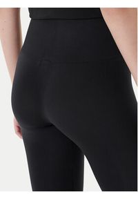 Calvin Klein Legginsy 701233380 Czarny Slim Fit. Kolor: czarny. Materiał: syntetyk