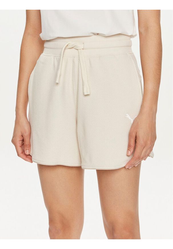 Puma Szorty sportowe HER 678701 Écru Regular Fit. Kolor: kremowy. Materiał: bawełna, syntetyk