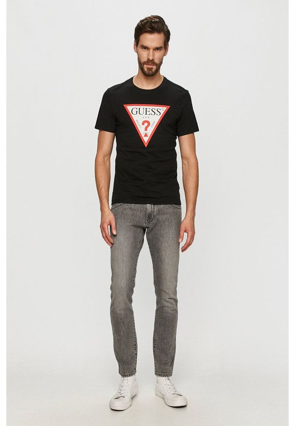 Guess - T-shirt. Okazja: na co dzień. Kolor: czarny. Materiał: dzianina. Wzór: nadruk. Styl: casual