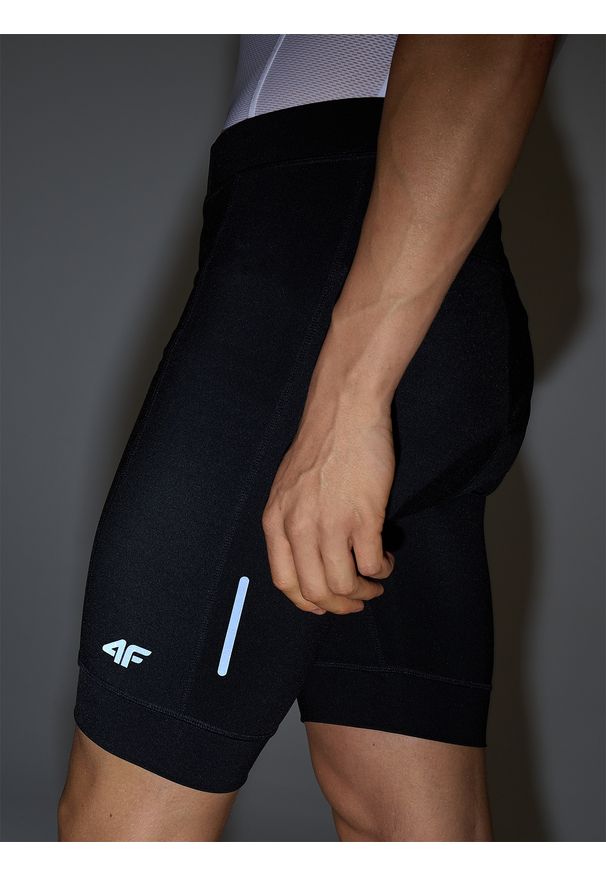 4f - 4F Legginsy krótkie rowerowe z żelowo-piankową wkładką męskie - czarne XL. Kolor: czarny. Materiał: materiał, dzianina, tkanina, syntetyk, poliester, włókno, elastan. Długość: krótkie. Wzór: ze splotem, gładki. Sport: kolarstwo