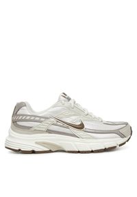Sneakersy Nike. Kolor: beżowy