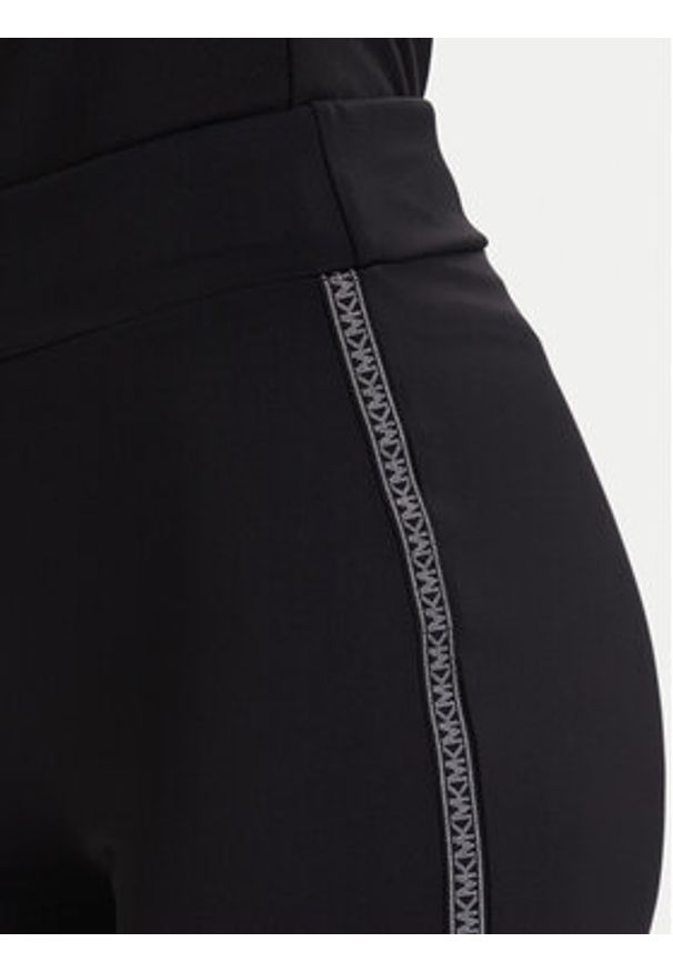 MICHAEL Michael Kors Legginsy MF530W51RE Czarny Flare Fit. Kolor: czarny. Materiał: syntetyk