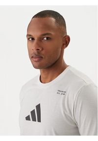 Adidas - adidas T-Shirt Category Training Graphic JM8976 Écru Regular Fit. Materiał: bawełna #3