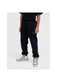 Regulowane spodnie dresowe dla dzieci Hummel Clean. Kolor: czarny. Materiał: dresówka. Sport: joga i pilates
