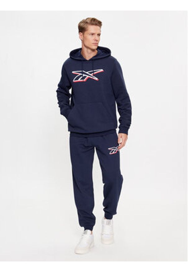 Reebok Spodnie dresowe Identity IN1685 Granatowy Regular Fit. Kolor: niebieski. Materiał: bawełna, syntetyk