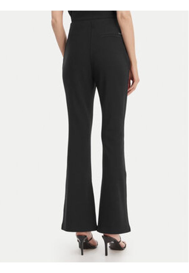Calvin Klein Spodnie materiałowe LV044B223G Czarny Flare Fit. Kolor: czarny. Materiał: syntetyk