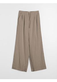 Sinsay - Spodnie wide leg z domieszką wiskozy - beżowy. Kolor: beżowy