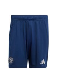 Adidas - Szorty Manchester United 24/25 Away. Kolor: niebieski. Materiał: materiał