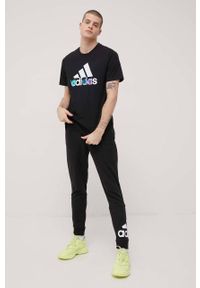 Adidas - adidas spodnie GK8968 męskie kolor czarny z nadrukiem. Kolor: czarny. Materiał: bawełna, poliester. Wzór: nadruk #4