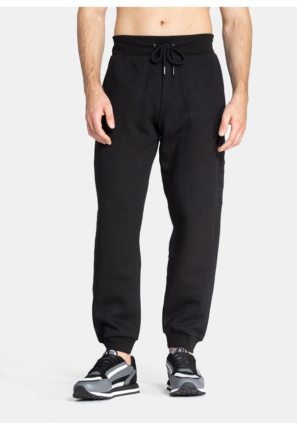 Spodnie męskie dresowe Guess Vaughn Pant (M1YB51K9V31-JBLK). Kolor: czarny. Materiał: dresówka