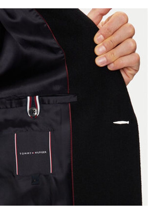 TOMMY HILFIGER - Tommy Hilfiger Płaszcz wełniany MW0MW36611 Czarny Regular Fit. Kolor: czarny. Materiał: wełna