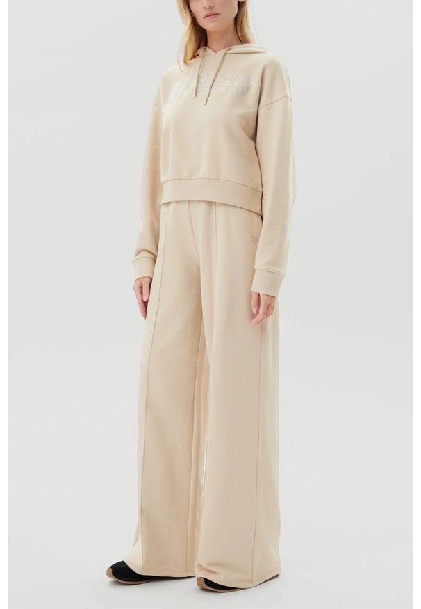 Guess - GUESS Beżowa bluza z kapturem damska z cyrkoniami Primula, Rozmiar L. Typ kołnierza: kaptur. Kolor: beżowy