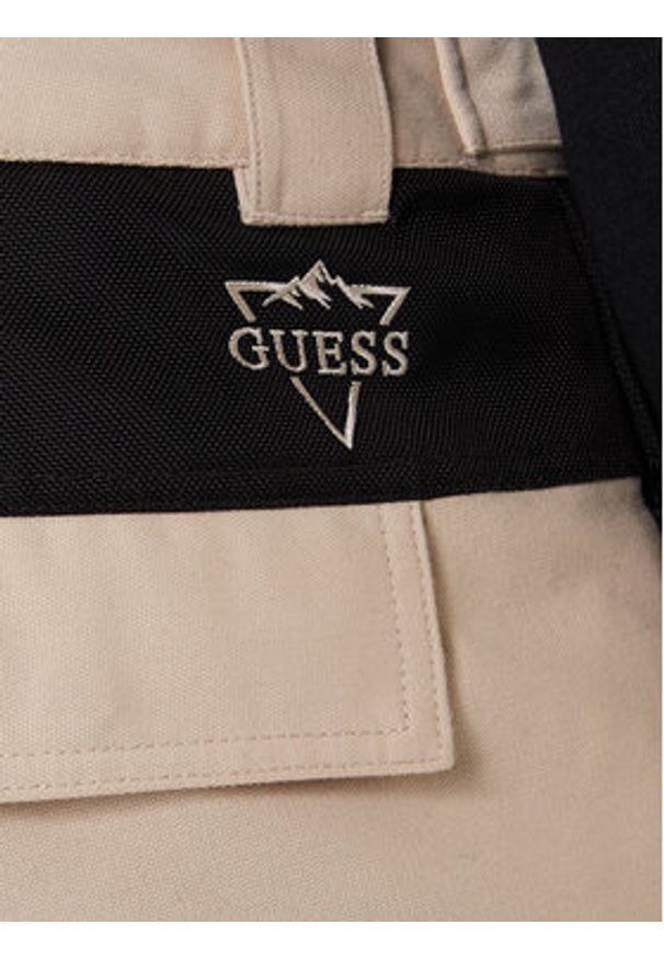 Guess Spodnie narciarskie M5BB77 WF182 Beżowy Regular Fit. Kolor: beżowy. Materiał: syntetyk. Sport: narciarstwo